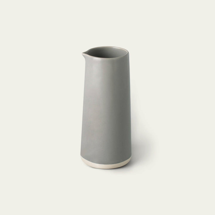 Elegant glass carafe with sleek design, perfect for serving beverages in style